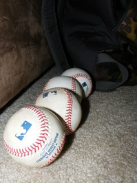 4 baseballs 3.27.JPG